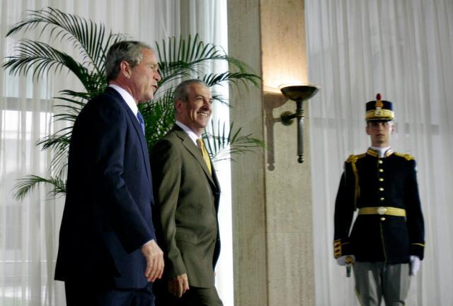 Bush l-a felicitat pe Tăriceanu pentru introducerea cotei unice de impozitare<br />Foto: Andrei Pungovschi/MEDIAFAX