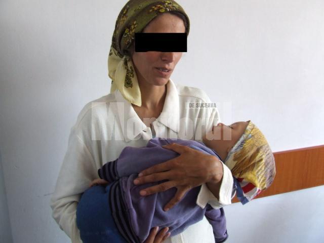 Una dintre mamele prinse de jandarmii suceveni  la cerşit cu copilul