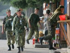 Rusia şi-a luat angajamentul să îşi retragă astăzi militarii din oraşul georgian Gori. Foto: AFP/MEDIAFAX