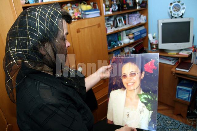 Ana Măntăluţă se mai consolează acum doar cu pozele fiicei sale Soţului si fiului femeii violate şi omorâte le-au mai rămas doar pozele cu chipul acesteia