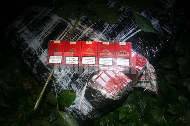 Colete de culoare neagră care conţineau 3.509 pachete de ţigări marca „Ronson” de provenienţă ucraineană