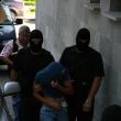 Escortaţi de mascaţi ai Jandarmeriei,  18 indivizi au fost aduşi în faţa procurorilor DIICOT