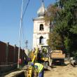Excavatoare si camioane grele agreseaza perimetrul Bisericii Sf Simion, cu precadere turnul clopotnita