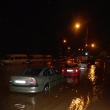 Străzi şi gospodării inundate, după ploaia torenţială de luni noapte