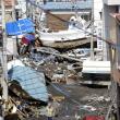 Bilanţul victimelor seismului şi valului devastator din Japonia a ajuns la 1.217 morţi, alte sute de persoane fiind în continuare dispărute (foto: AP Photo/Kyodo News)