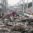 Bilanţul victimelor seismului şi valului devastator din Japonia a ajuns la 1.217 morţi, alte sute de persoane fiind în continuare dispărute (foto: AP Photo/Kyodo News)