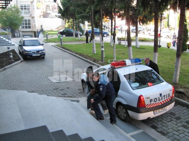 Fraţii Curaleţ, în 2008, când au fost reţinuţi de oamenii legii