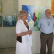 Directorul muzeului, Elvira Romaniuc, şi prof. Ioan Bodnar, iniţiatorul taberei de pictură
