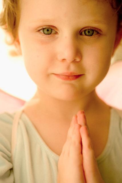 Părinţii religioşi au mai mult succes în educarea copiilor lor. Foto: CORBIS