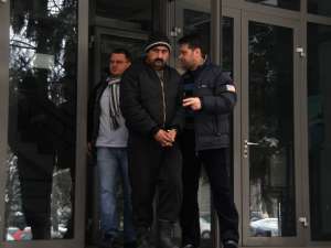 Costică Nicuşor Buraciuc a intrat liber în clădirea Parchetelor, însă a ieşit încătuşat, escortat de doi poliţişti de la Investigaţii Criminale