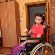 La 15 ani, Oana - Elena Cojocari este ţintuită într-un scaun cu rotile