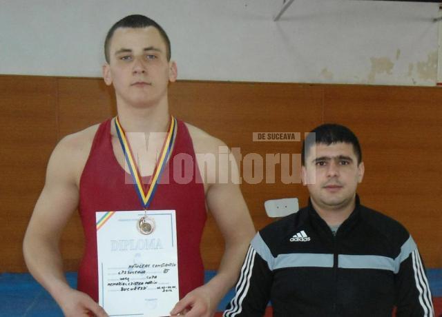 Constantin Huţuleac alături de antrenorul său, Andrei Bolohan