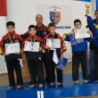 Băieţii de la „Kim Long Dao” Fălticeni, locul III la Campionatul Naţional,  împreună cu instructorul Maxim