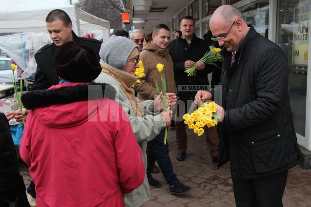 liberalii suceveni oferind flori