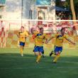 Bucuria fotbaliștilor după fluierul final al partidei