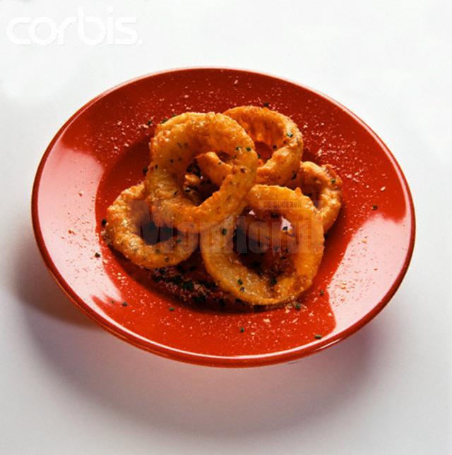 Roşul ar trebui folosit în cazul persoanelor care trebuie să îşi limiteze cantitatea de hrană Foto: CORBIS
