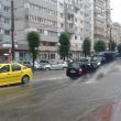 Străzi inundate de ploaia torenţială din Suceava