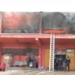 Centrul Comercial Rozita din Şcheia, mistuit de flăcări