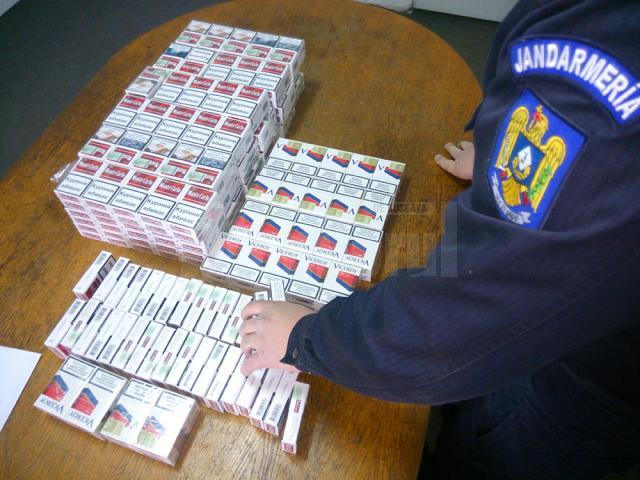 Tranzacţie de ţigări de contrabandă, surprinsă de jandarmi