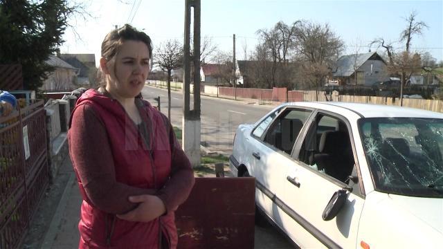 Elena Lupitrec şi maşina soţului ei distrusă