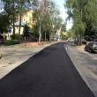 Primul strat de asfalt turnat ieri pe o banda a străzii Mărăşeşti