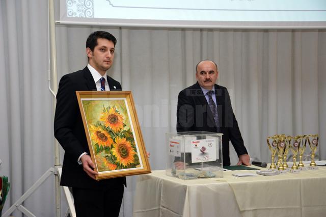 Licitaţia tabloului „Floarea-soarelui”, donat de Cristina Hreamată Macoveiciuc, la ediţia a II-a a Galei