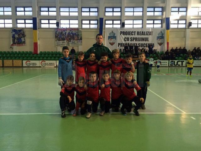 Antrenorul Andrei Iţco împreună cu jucătorii care au reuşit această frumoasă performanţă