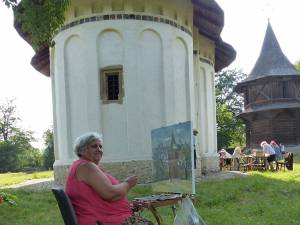 Biserica monument UNESCO surprinsă în mai multe unghiuri de pictori