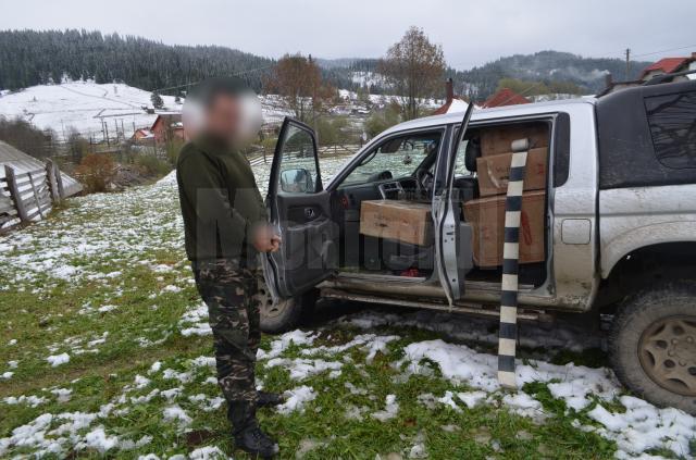 In interiorum masinii de teren politistii au descoperit aproape 14.000 de pachete cu tigari