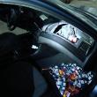BMW-ul cu ţigări ascunse în bord şi praguri, confiscat