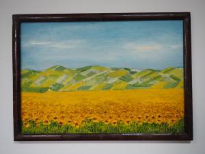 „Floarea soarelui la marginea Sucevei” (53x38), înrămat, autor Ioan Bodnar, preţ 100 de dolari