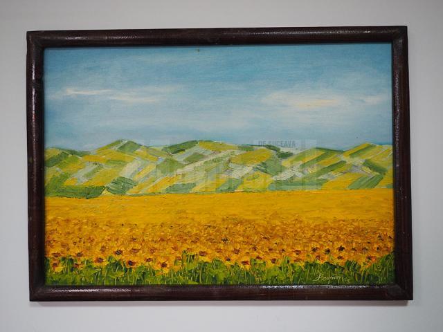 „Floarea soarelui la marginea Sucevei” (53x38), înrămat, autor Ioan Bodnar, preţ 100 de dolari