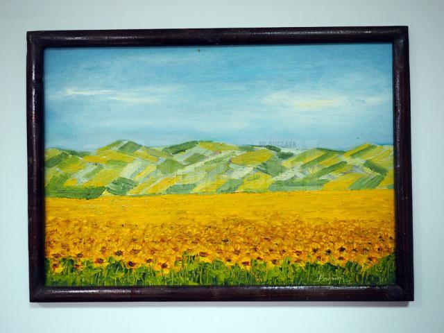 „Floarea soarelui la marginea Sucevei" (53x38), înrămat, autor Ioan Bodnar, preţ 100 de dolari