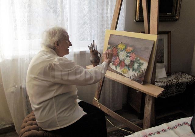 Ana Candrea Constantin, în pragul vârstei de 96 de ani: „Aştept primăvara, să pictez în grădina de la Cotârgaşi!”