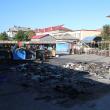 Incendiu puternic la tarabele din Piaţa Burdujeni, de la o candelă uitată aprinsă