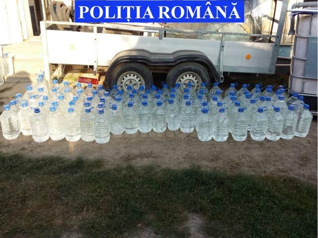 O tonă de alcool, confiscată de poliţişti