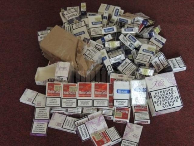 Peste 14.000 de pachete de ţigări de contrabandă, confiscate de poliţişti
