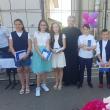 Copiii cu medii de 10 premiaţi de preotul Constantin Bobu