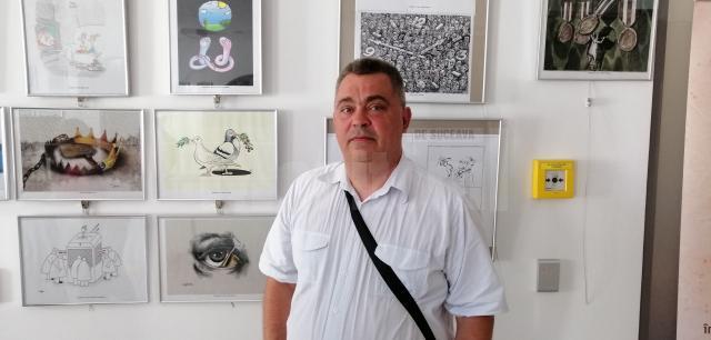 Ovidiu Ambrozie Bortă BOA – caricaturist, organizator şi membru al juriului