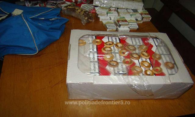 Ţigări ascunse în cutii cu prăjituri şi cereale, descoperite în PTF Siret