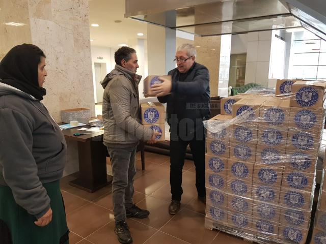 Distribuirea ajutoarelor de la UE în incinta Orizont Plaza Burdujeni