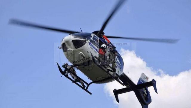 Un elicopter acționează în Suceava, în cadrul unei acțiuni care urmărește tăierile ilegale de pădure