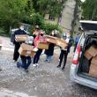 Voluntarii Asociației Tinerilor Ortodocși au împărțit 400 de pizza unor familii nevoiașe