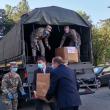 Gheorghe Flutur a ajutat la descărcarea echipamentelor donate de armata americană