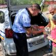 Polițiștii au oferit rechizite și ghiozdane copiilor din mai multe comunități nevoiașe