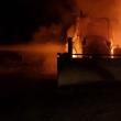 Două excavatoare au ars joi seara, în curtea unei stații de asfalt din Fălticeni