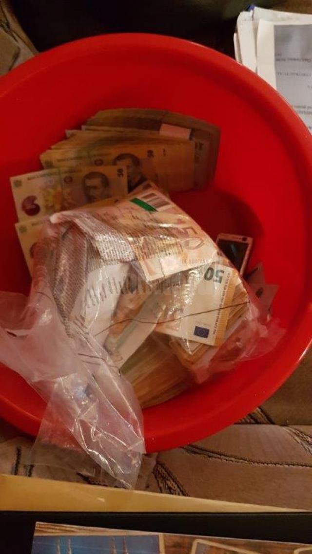 Sumele de bani găsite la perchezițiile din dosarul ”Permise și Înmatriculări” depășesc 2,2 milioane de euro