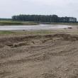 Și Apele Române au amendat firma care exploata ilegal balast din râul Siret