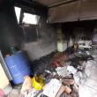 Mansarda și garajul unei gospodării din Șcheia, cuprinse de flăcări
