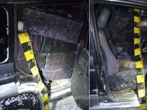 Mașină de teren burdușită cu țigări de contrabandă, abandonată în pădure
